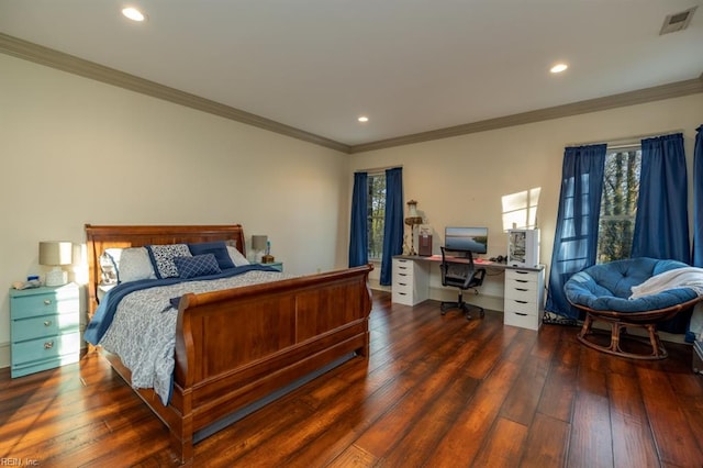 bedroom featuring dark hardwood / wood-style floors and crown molding