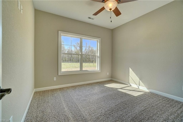 carpeted empty room with ceiling fan