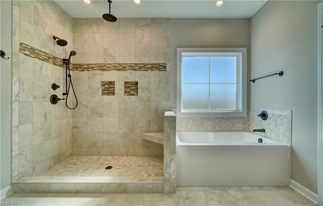 bathroom featuring plus walk in shower