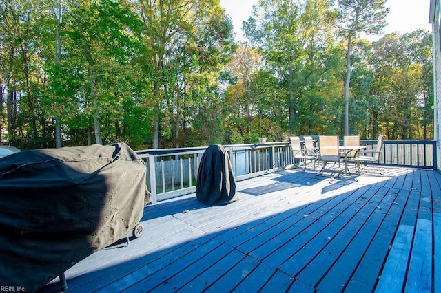 wooden deck with area for grilling