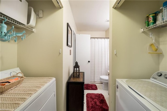 laundry area featuring separate washer and dryer