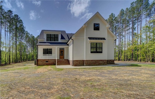 modern inspired farmhouse featuring a porch