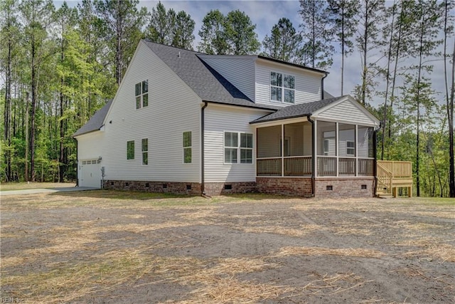 view of front of property with a sunroom