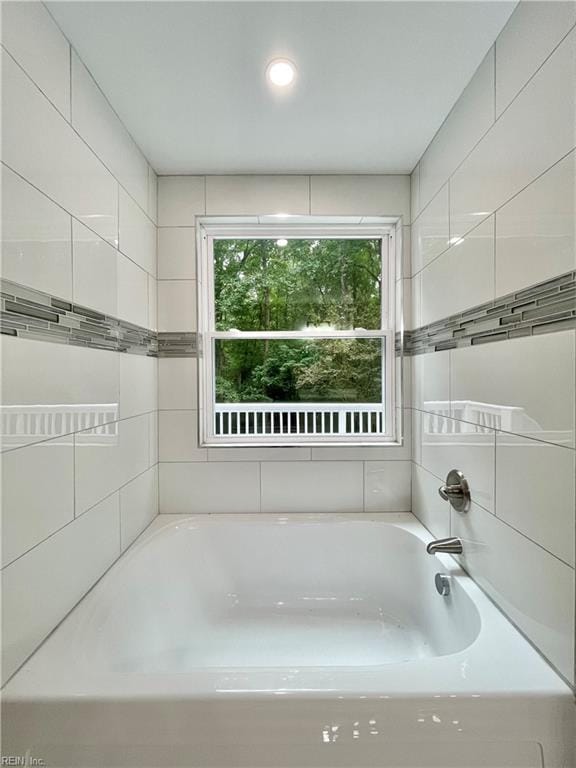 bathroom featuring a bathtub