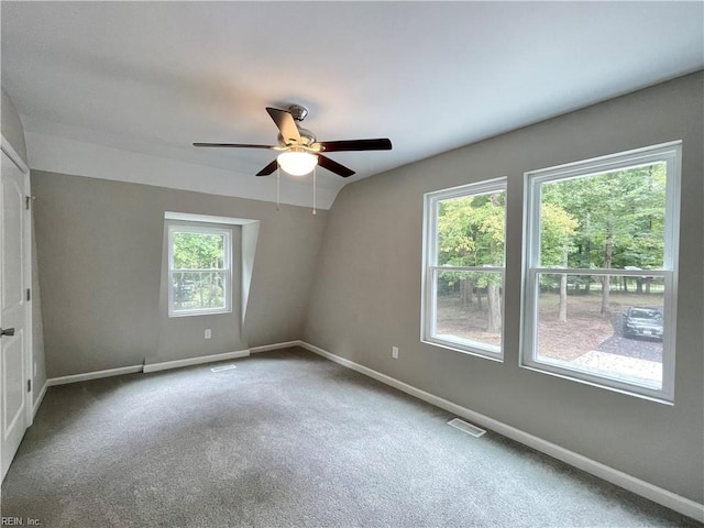 empty room featuring carpet and ceiling fan