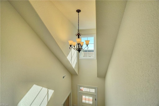 interior details with an inviting chandelier