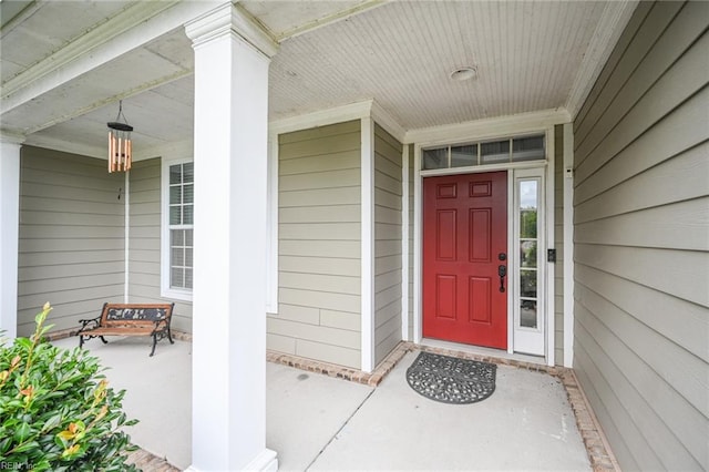 property entrance with covered porch