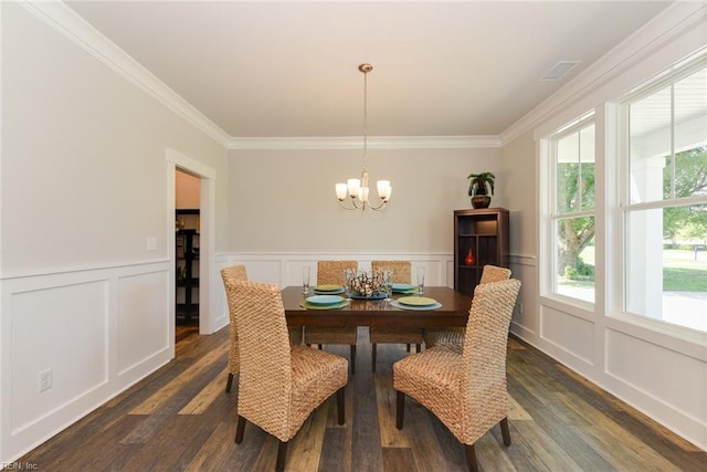 dining room with plenty of natural light, dark hardwood / wood-style flooring, and crown molding