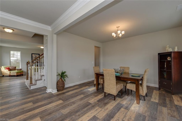 dining space with ornamental molding, dark hardwood / wood-style floors, and a notable chandelier