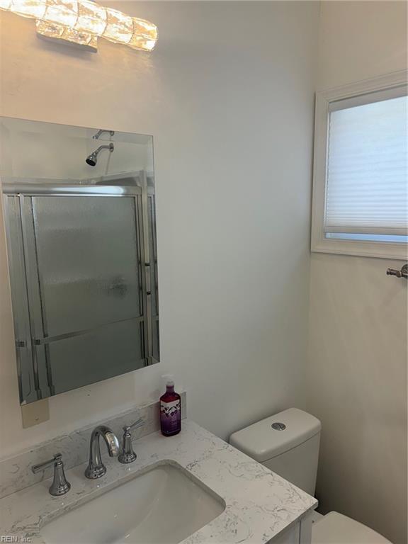 307 N First St, Hampton, VA 23664 - bathroom with a shower stall, toilet, and vanity