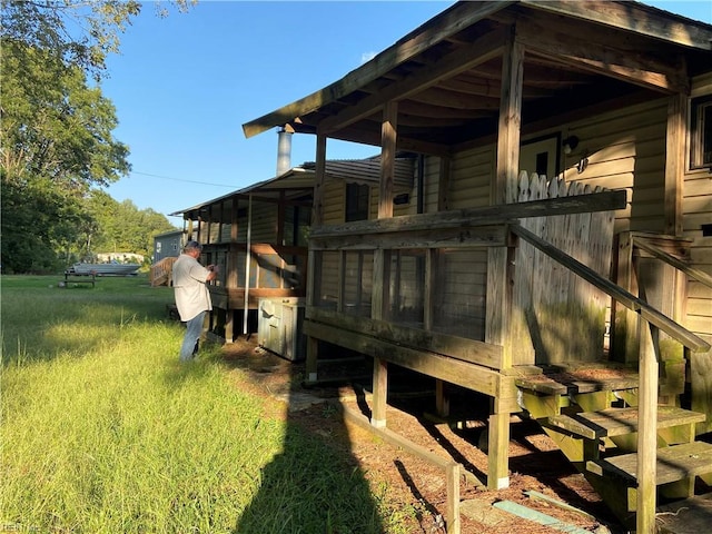 wooden deck with a yard