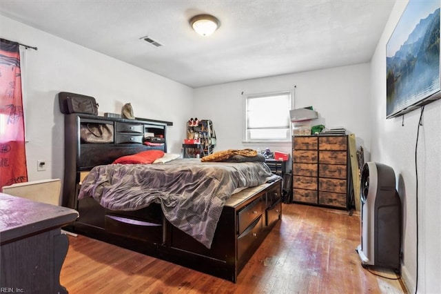 bedroom featuring hardwood / wood-style flooring