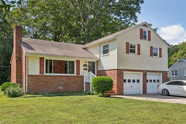 split level home featuring a garage and a front yard