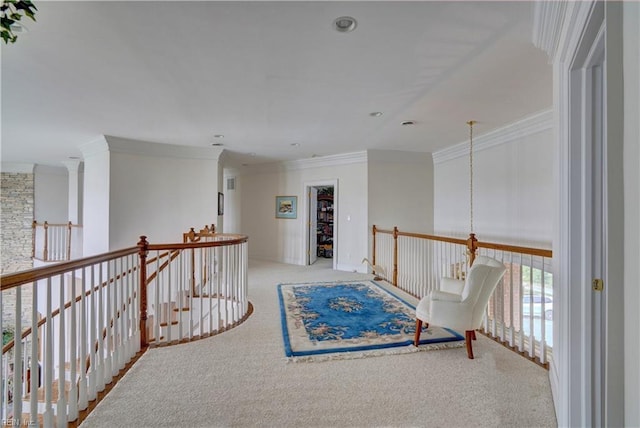 hallway with light carpet and ornamental molding