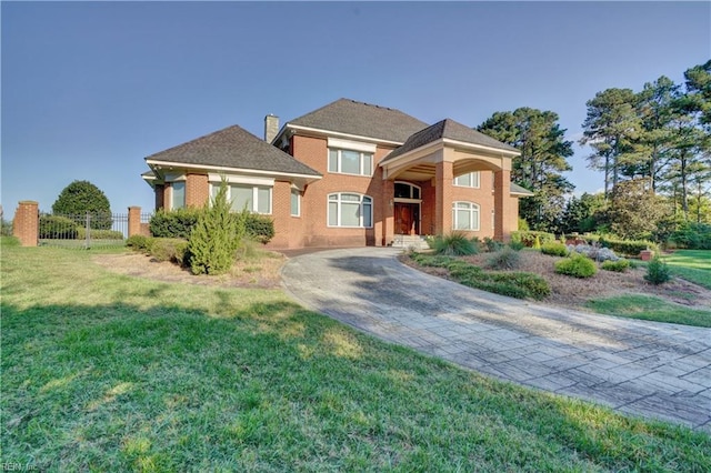 view of front of property with a front lawn