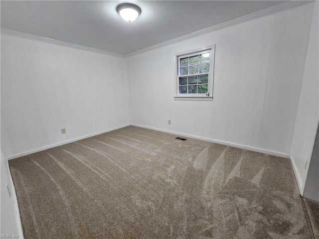 unfurnished room with carpet floors and ornamental molding