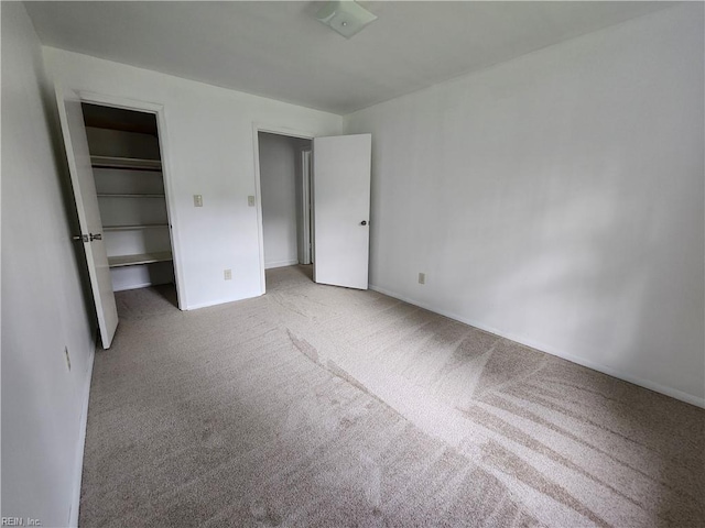 unfurnished bedroom featuring carpet flooring