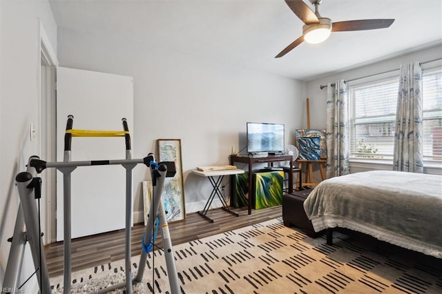 bedroom featuring ceiling fan and light hardwood / wood-style flooring