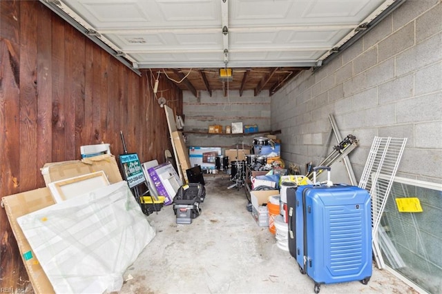 garage with wood walls