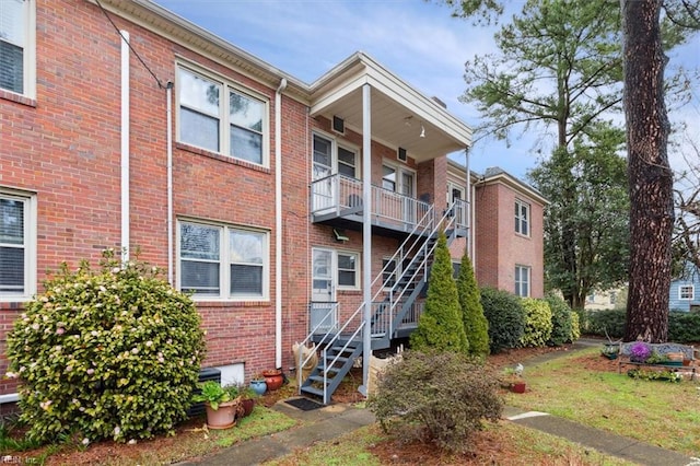 back of property featuring a porch