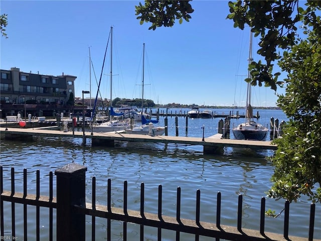 dock area featuring a water view