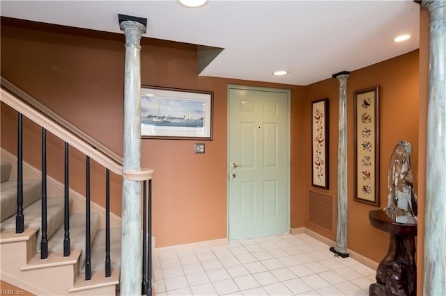 view of tiled foyer entrance