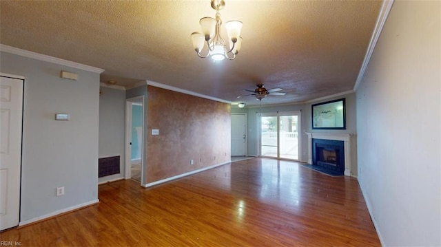 unfurnished living room featuring hardwood / wood-style flooring, ceiling fan with notable chandelier, crown molding, and a textured ceiling