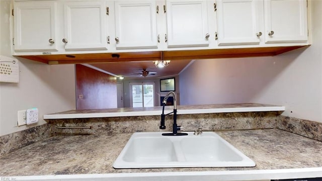 kitchen with white cabinets and sink