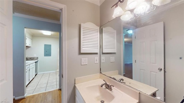 7 Tamarisk Quay Quay Unit 7B, Hampton, VA 23666 - bathroom with crown molding, vanity, electric panel, wood finished floors, and a notable chandelier