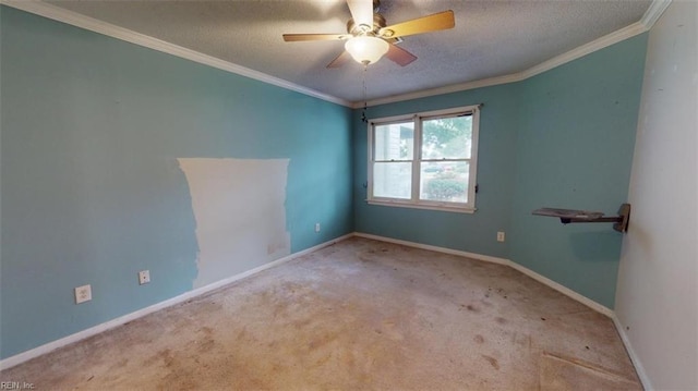 empty room with a textured ceiling, ornamental molding, light carpet, and ceiling fan