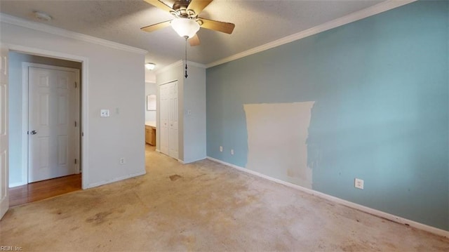 7 Tamarisk Quay Quay Unit 7B, Hampton, VA 23666 - unfurnished bedroom with light carpet, baseboards, crown molding, and a textured ceiling