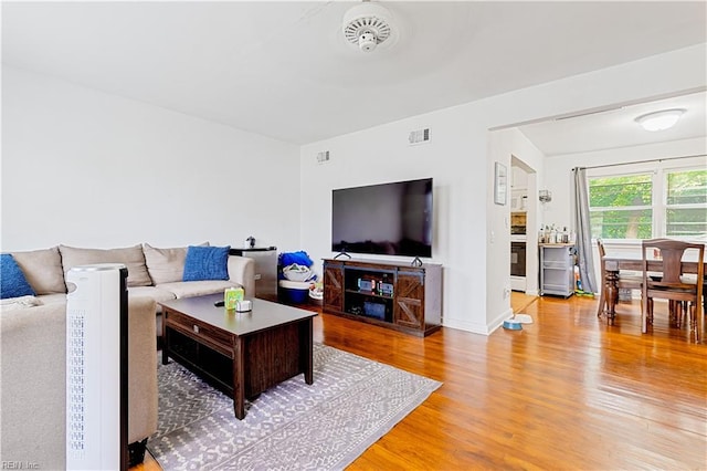 living room featuring light hardwood / wood-style flooring