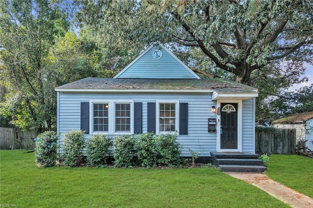 bungalow with a front lawn