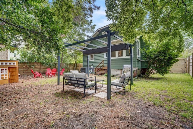 view of yard featuring an outdoor living space, a pergola, and central air condition unit