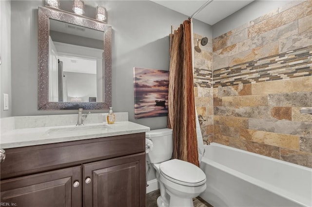 full bathroom with shower / bath combination with curtain, vanity, and toilet