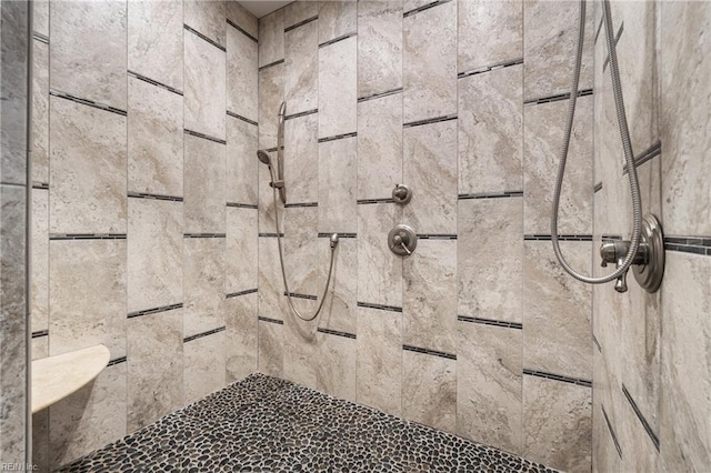 room details with a tile shower