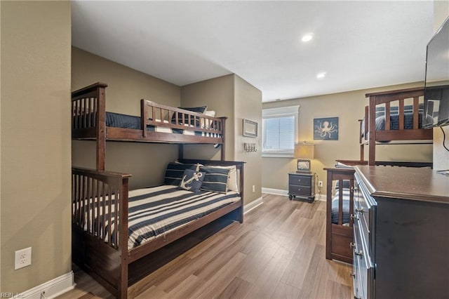 bedroom with light hardwood / wood-style flooring