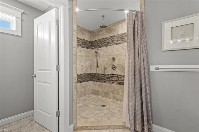 bathroom featuring a shower with curtain