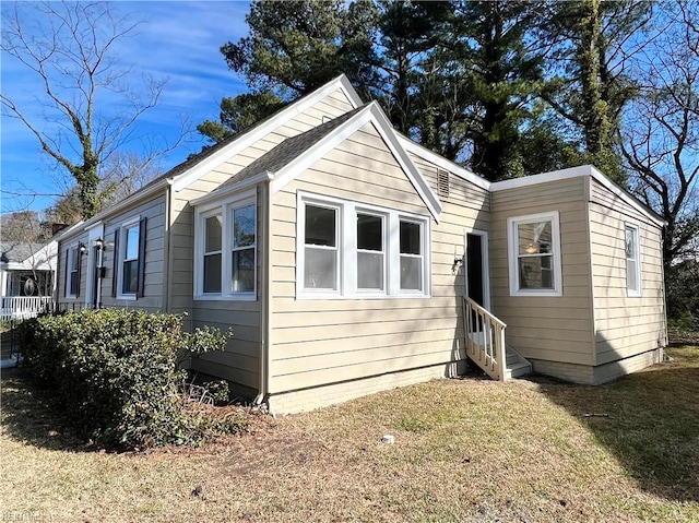 exterior space with a yard