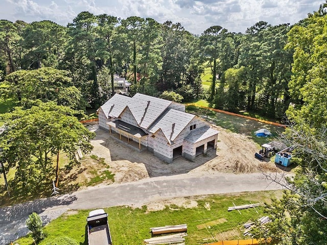 bird's eye view featuring a forest view