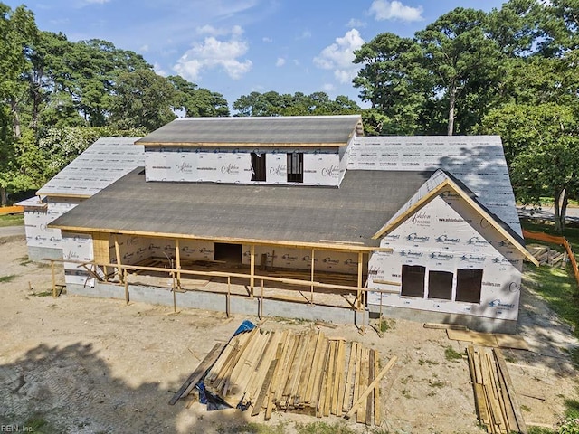 view of front of house featuring an outbuilding