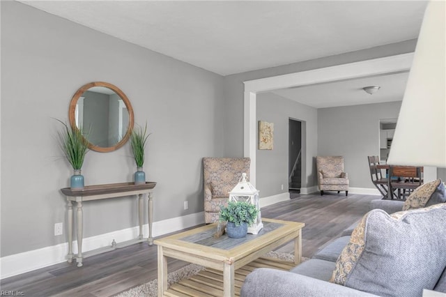 living room featuring dark hardwood / wood-style floors