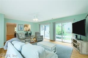 living room with light hardwood / wood-style floors