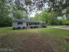 view of front of home with a front yard