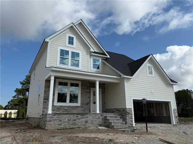 craftsman-style house featuring a garage