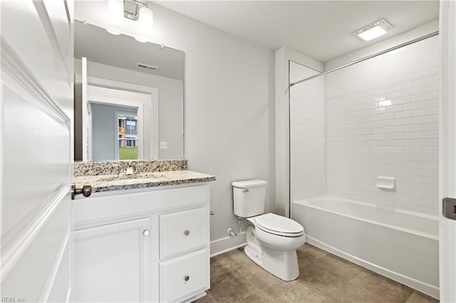 full bathroom with vanity, toilet, and tiled shower / bath