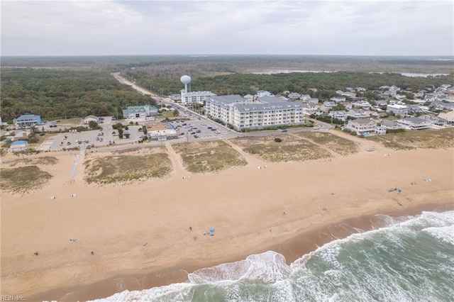 aerial view featuring a water view and a view of the beach