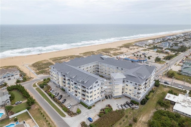 aerial view with a beach view and a water view