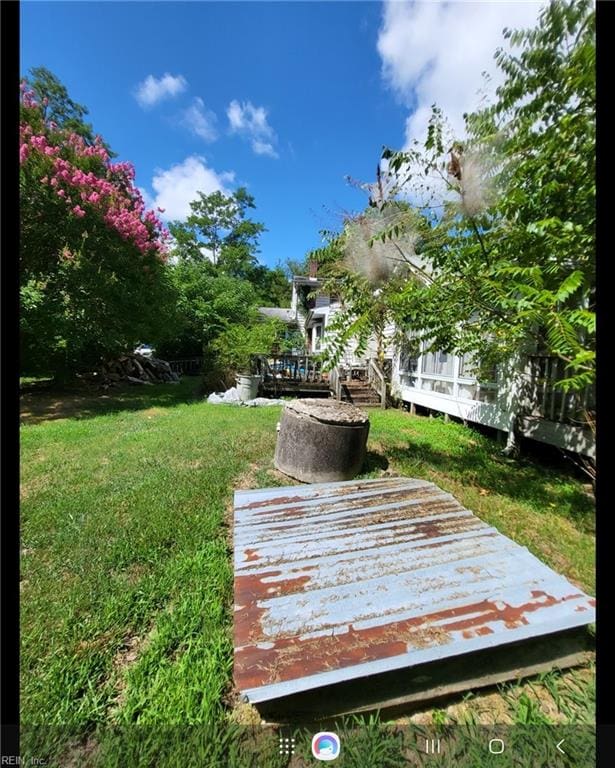 view of yard featuring a deck