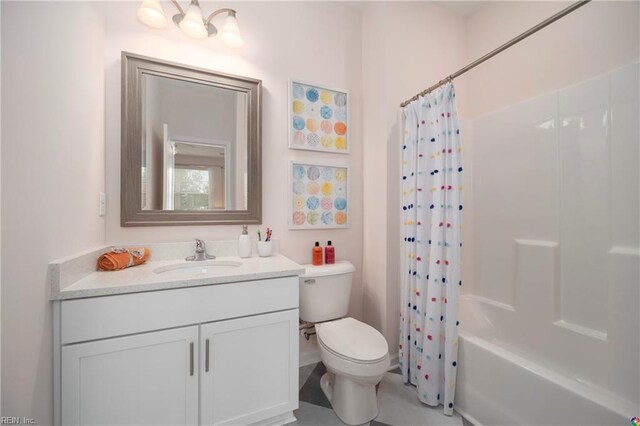 full bathroom with vanity, toilet, and shower / bath combo